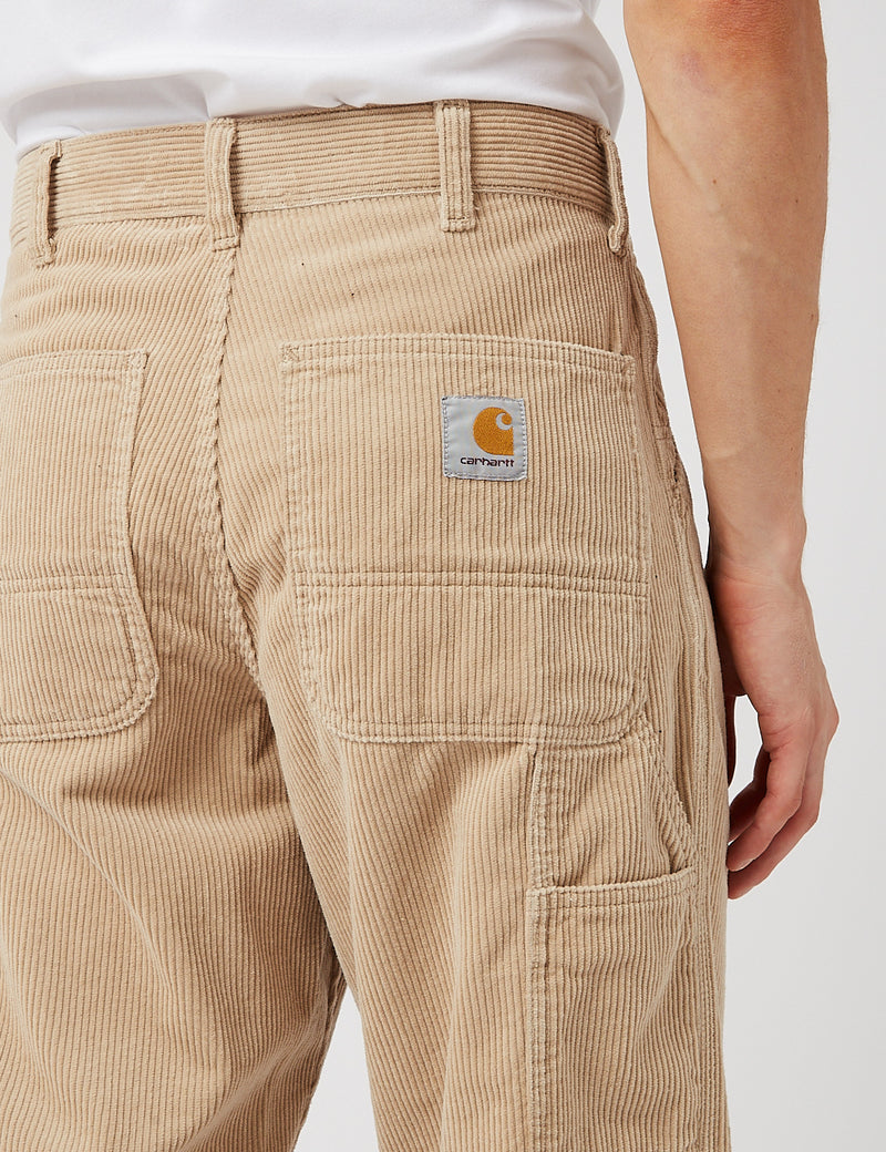 Carhartt WIP single knee corduroy trousers in burnt orange  ASOS