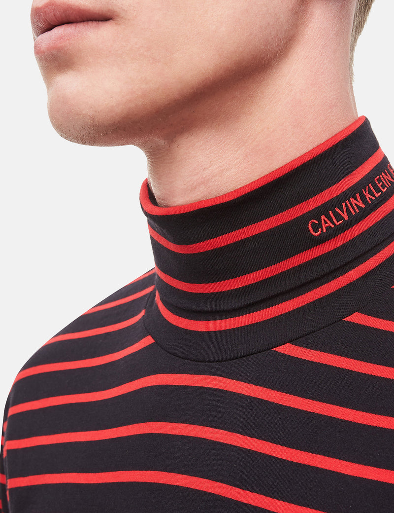 Calvin Klein Stripe L / S Pullover mit Stehkragen - CK Schwarz / Rot
